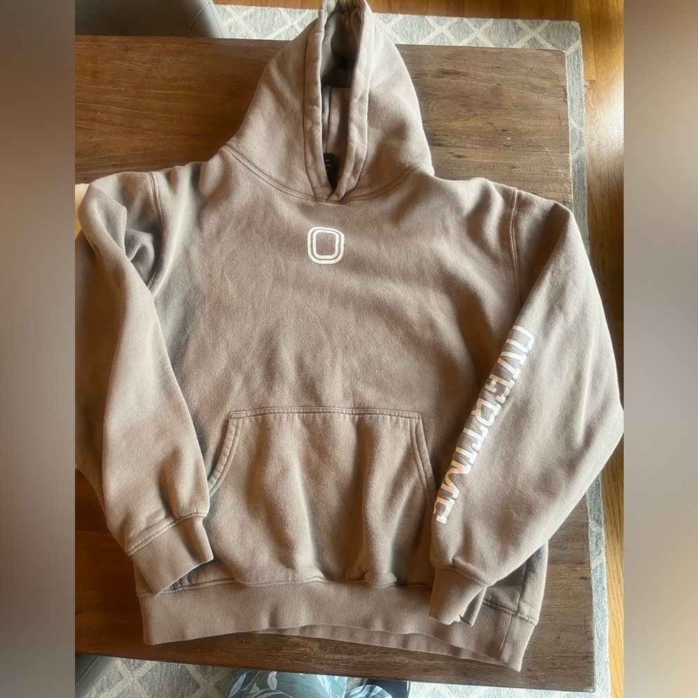 Tan youth xl overtime hoodie. Very minor piling. Good condition